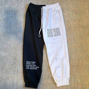 Social tourists black and white sweatpants